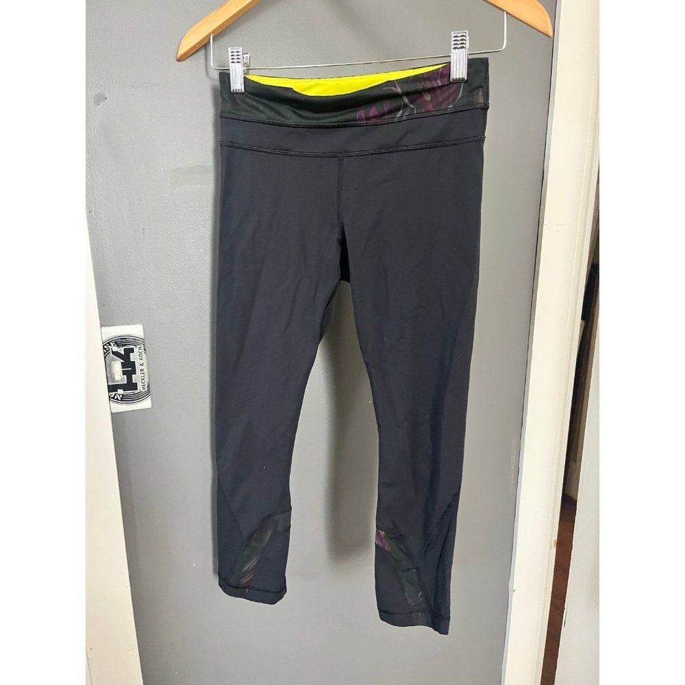 Lululemon size 6 Run: Inspire Crop II Capri Leggings Black Yellow Floral Mesh